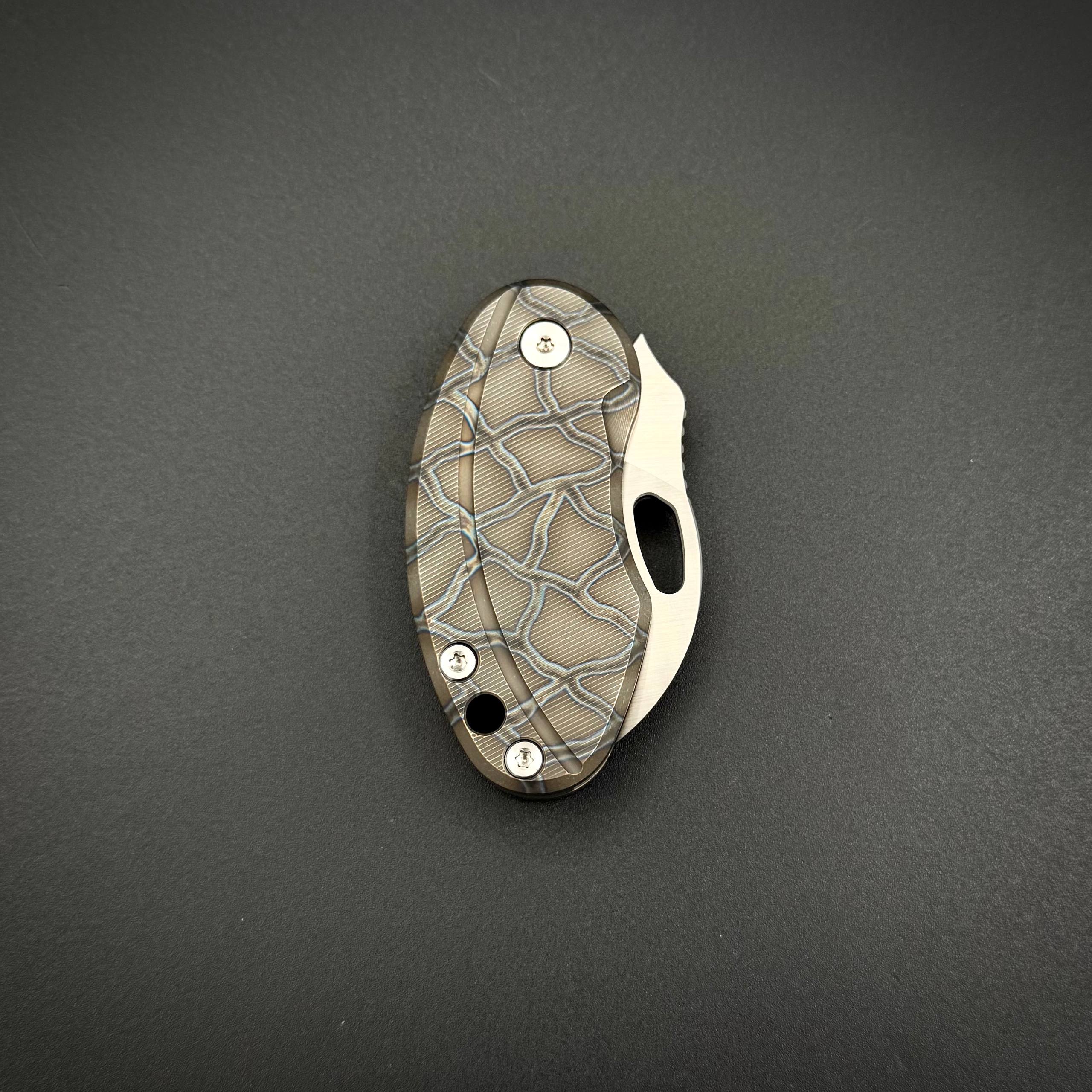 Складной нож BUG Anodized Sandvik 14C28N Titanium Pioneer EDC