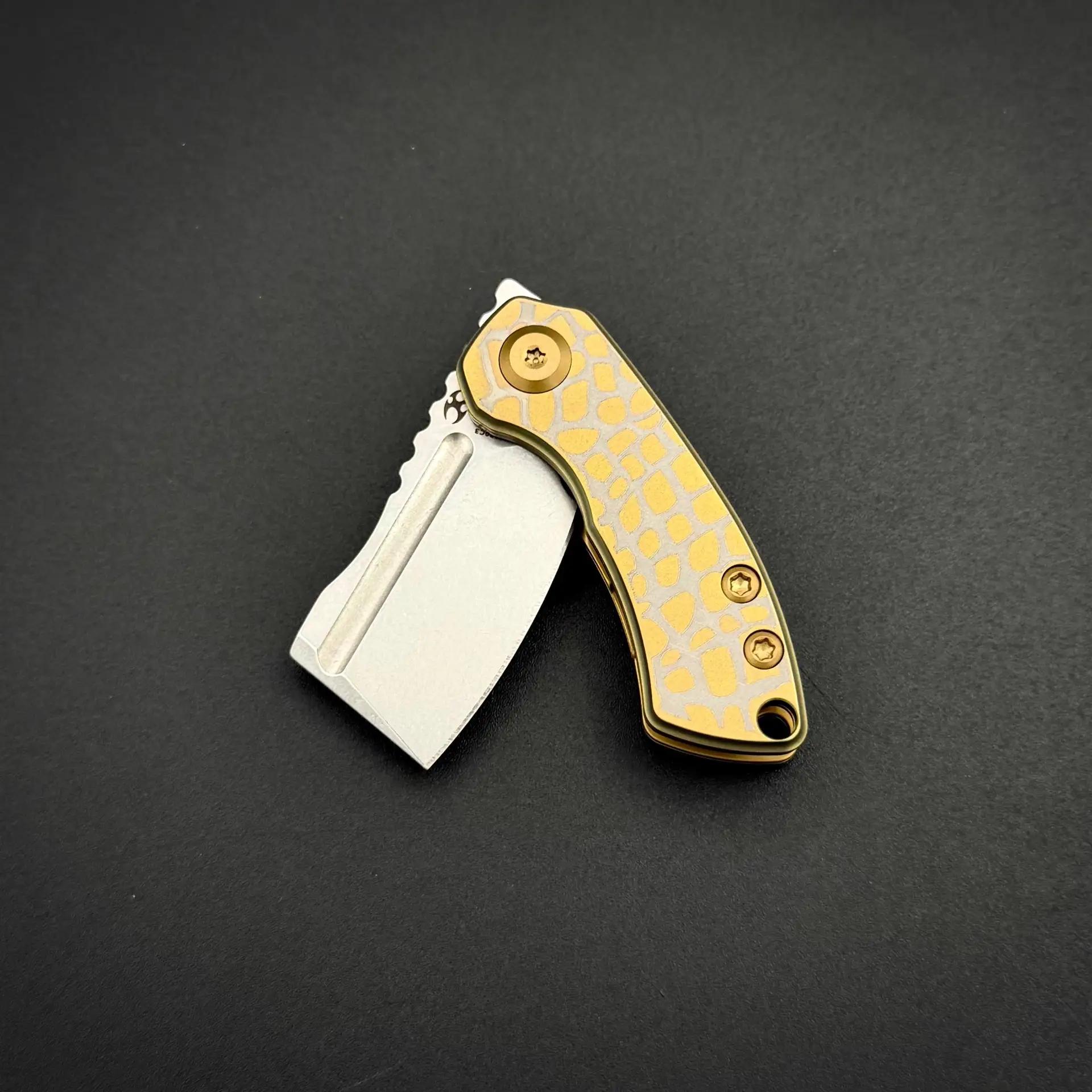 Складной нож Mini Korvid 154CM Golden Anodized Titanium with Laser-Etched Cracked Eggshell Pattern